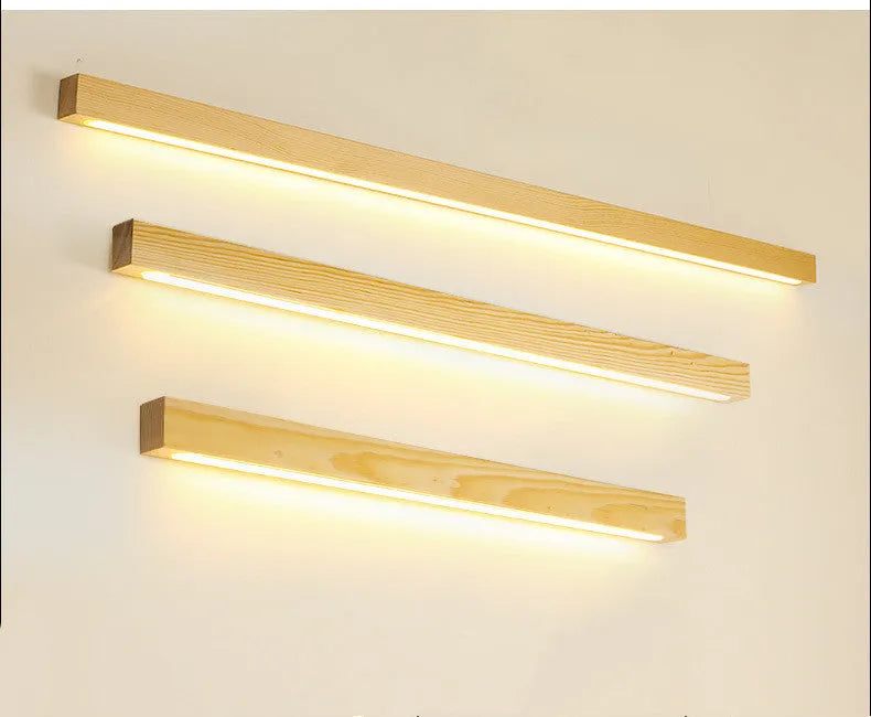 Modern walnut-colour wood and acrylic LED strip wall lamp in 60cm, 80cm or 120cm lengths.