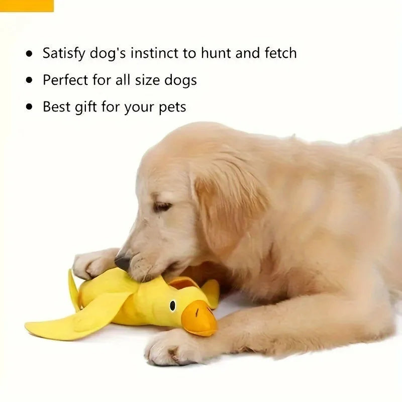 Yellow plush duck dog training toy with squeaker and treat dispensing features