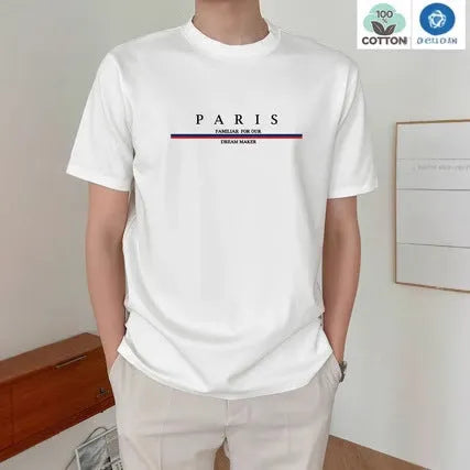 Man wearing a loose fit pure cotton t-shirt with a printed letter design on the front in apricot colour.