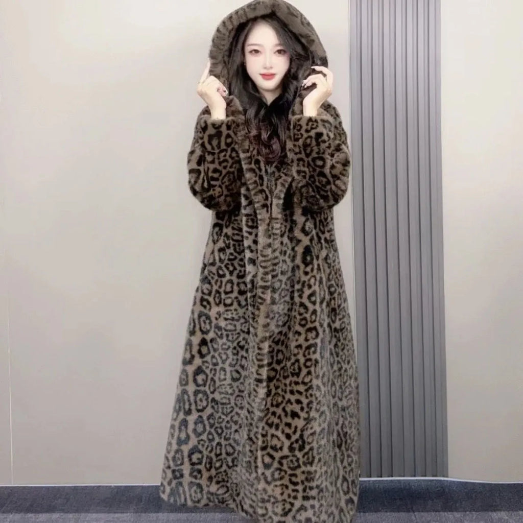 Loose-fitting plus size long faux fur coat in brown leopard print colour, showing regular sleeves and long hem.