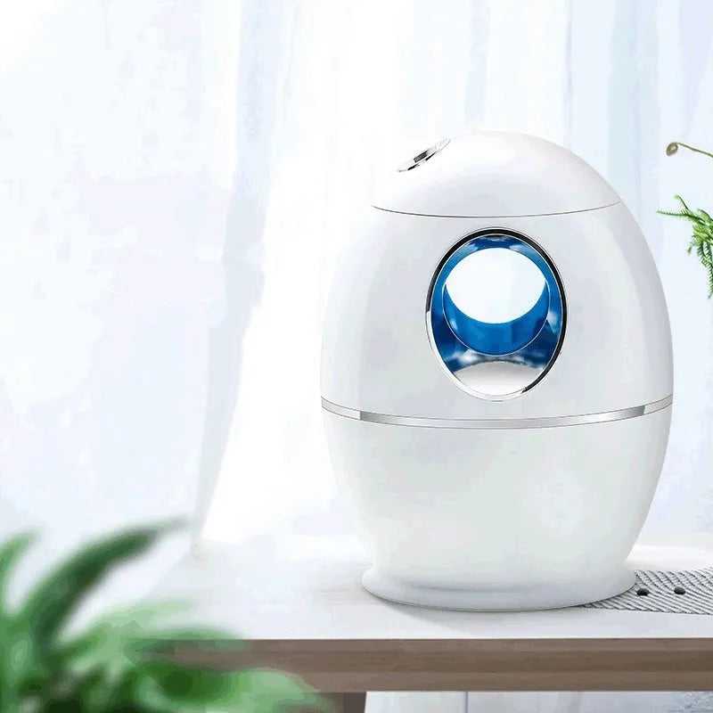 White columnar household air disinfection humidifier with USB cable on a table