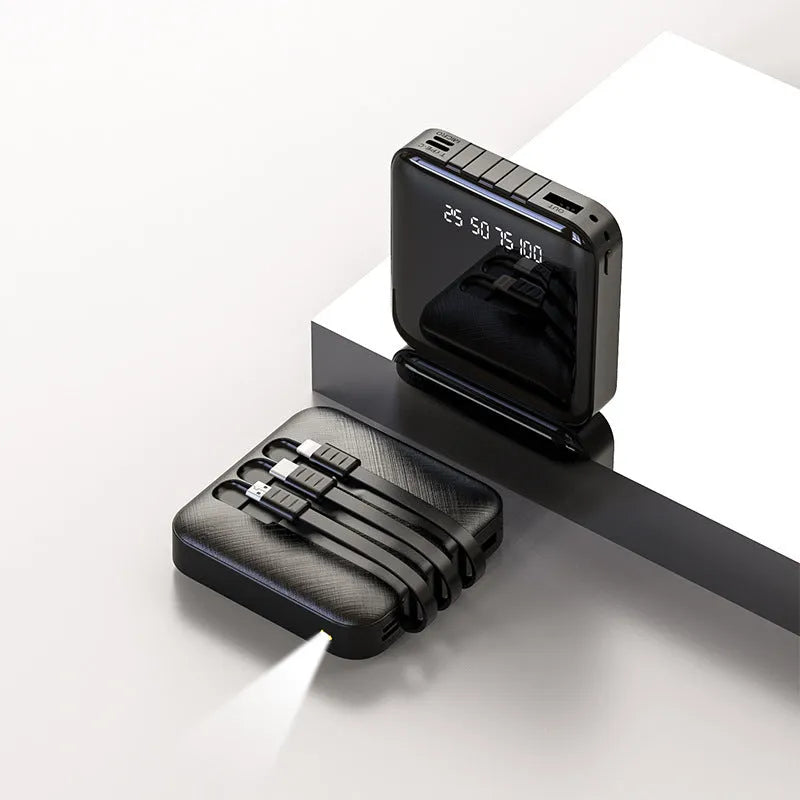 Black rectangular power bank with integrated charging cable showing 10000mAh capacity