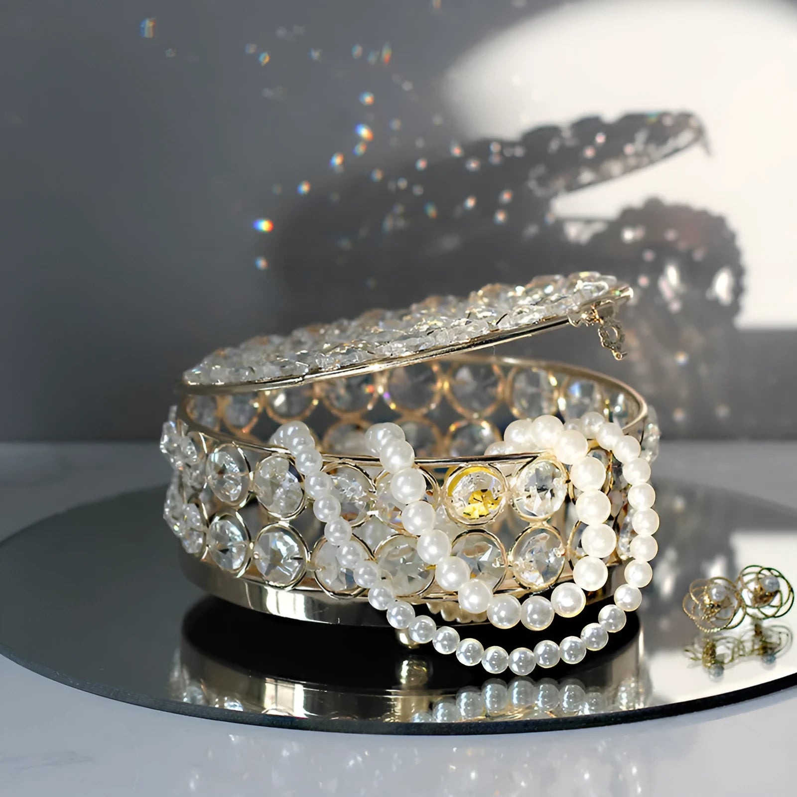 Transparent crystal glass jewellery box with French gold metal accents in European style design