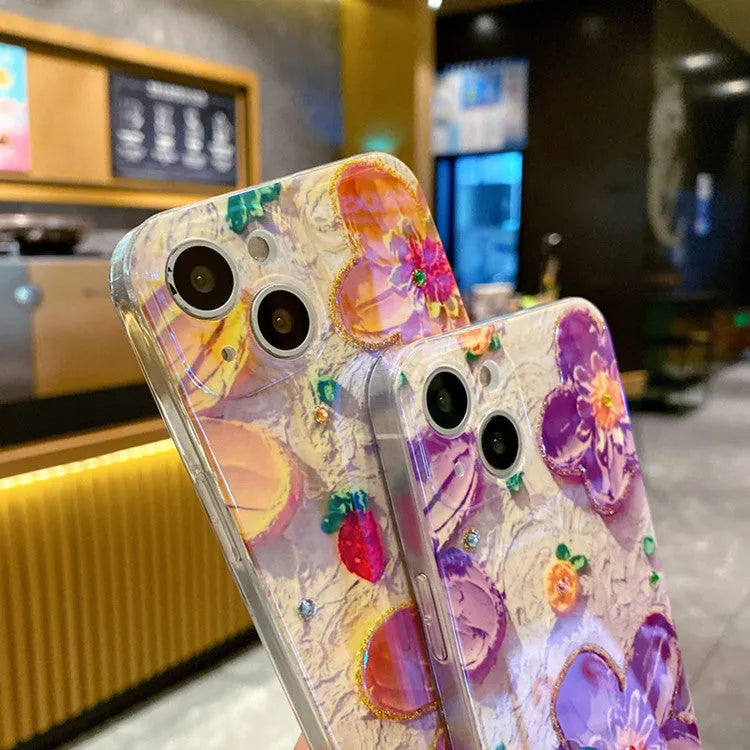 Purple and yellow soft rubber phone cases with ornate oil painting flower design and blue inlays.