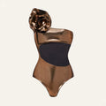 Gold coloured one-piece halterneck swimsuit with hollow-out details on a mannequin.