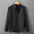 Long sleeve linen cardigan shirt in Chinese style, shown in a loose fit on a person.