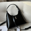 Genuine leather dumpling-shaped crossbody bag with shoulder strap and multiple pockets