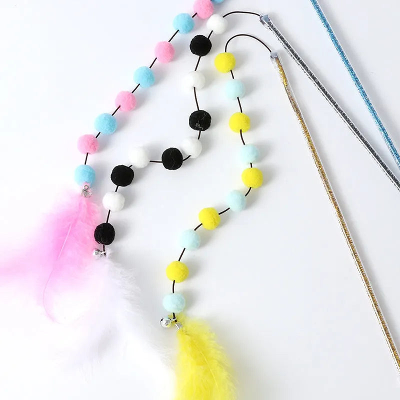 Cat teaser wand toy with plush ball, feathers, and plastic rod, about 31 cm long, random colour
