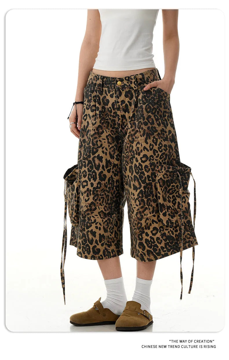 Leopard print women's trousers with high waist, button fly, and cropped straight-leg design