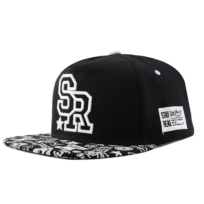 Cotton baseball cap with embroidered letters in black colour showing dome crown shape