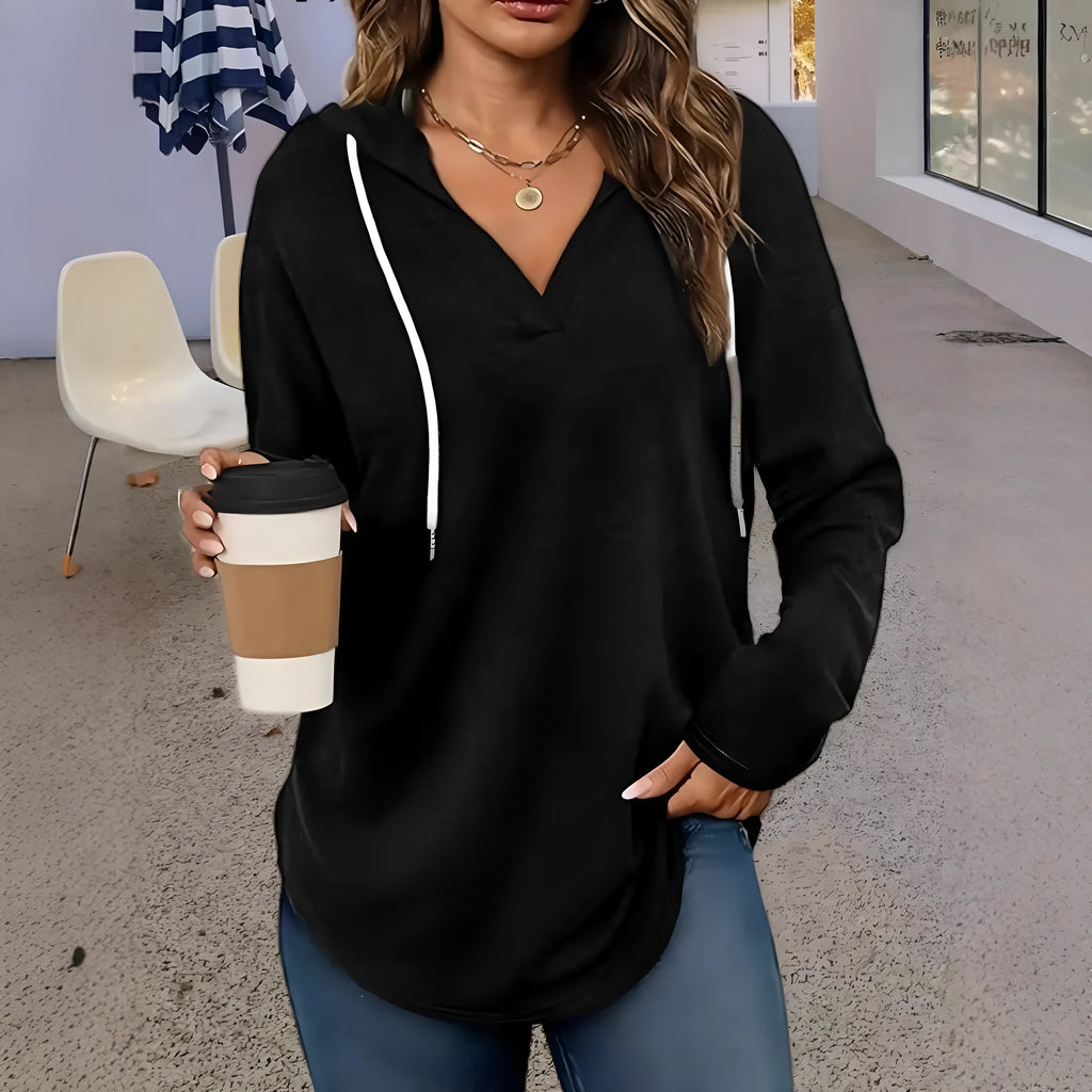 Women's red hooded V-neck sweatshirt with long sleeves on hanger