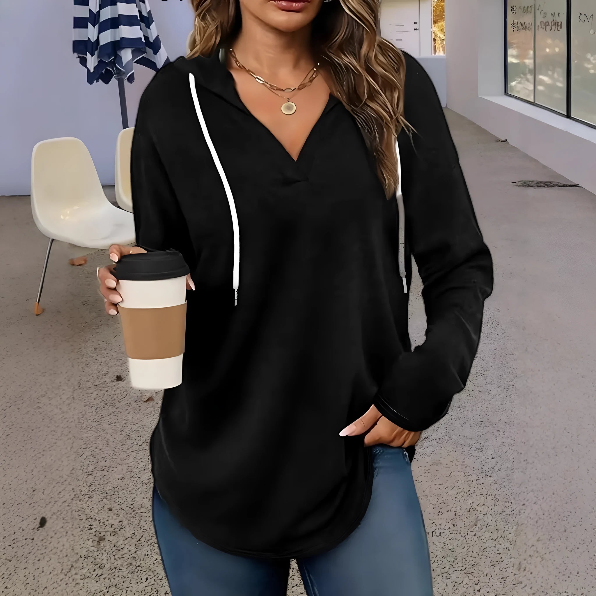 Women's red hooded V-neck sweatshirt with long sleeves on hanger