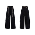 Men's dark blue loose fit straight leg jeans with zipper decoration and belt stitching detail.