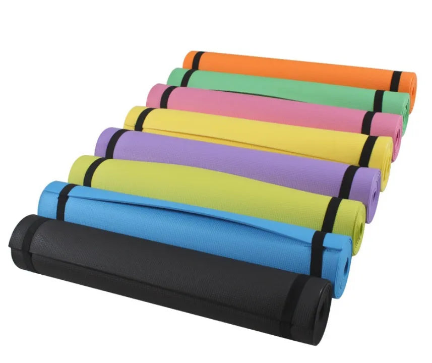 Red EVA fitness yoga mat with 6mm thickness on a wooden floor.