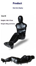 Black patent leather bondage set with full body wrap and six ratcheting tie down straps