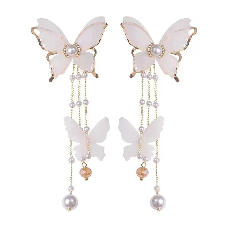 Butterfly tassel lace pearl rhinestone earrings with white electroplated finish