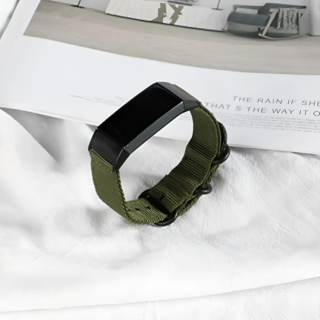 Nylon three-ring buckle replacement strap for Fitbit Charge fitness trackers in army green colour.