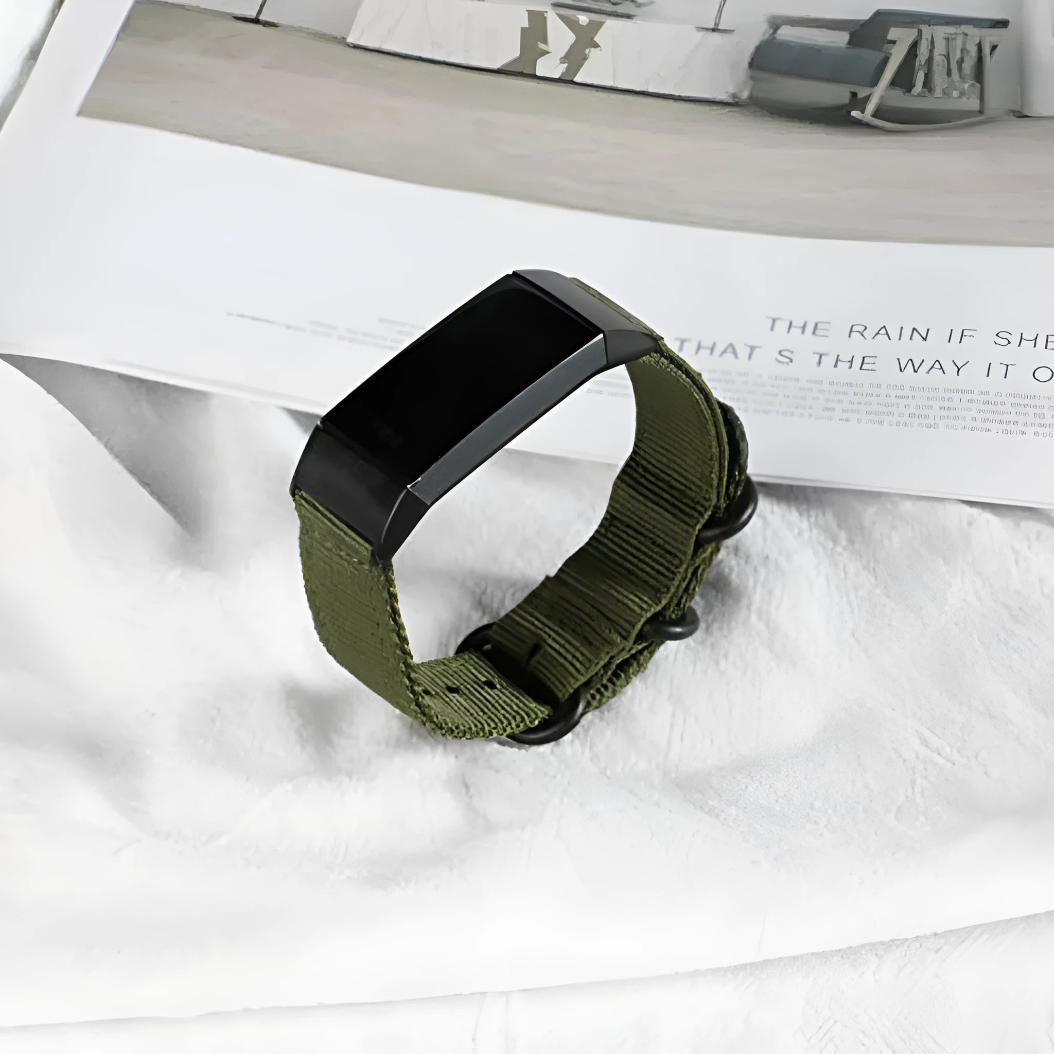 Nylon three-ring buckle replacement strap for Fitbit Charge fitness trackers in army green colour.
