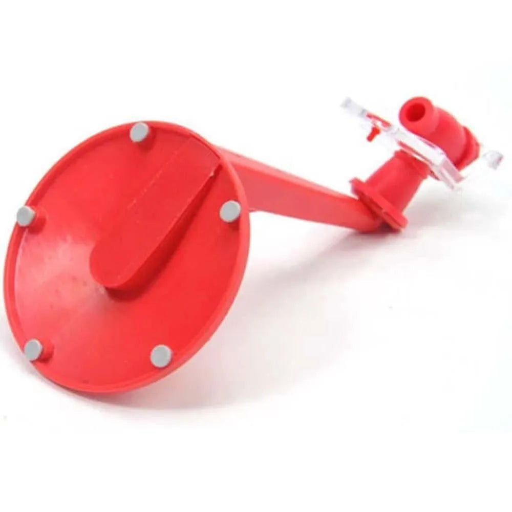 Red plastic Magic Tap soda bottle dispenser attached to a 2-litre drink bottle