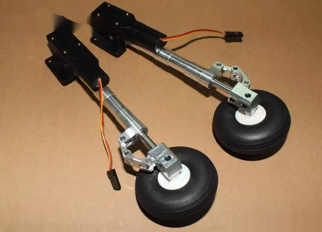 Retractable alloy landing gear for toy aircraft with shock-absorbing damping and multiple wheel size options