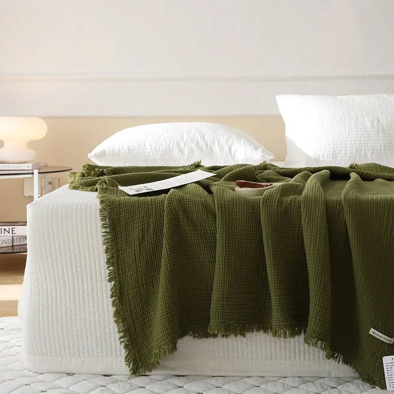 Four-layer gauze cotton blanket with tassel fringe in avocado green colour