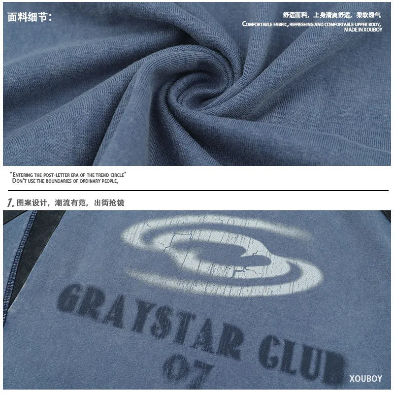 Men's blue hip hop letter print cotton t-shirt with raglan sleeves on a hanger