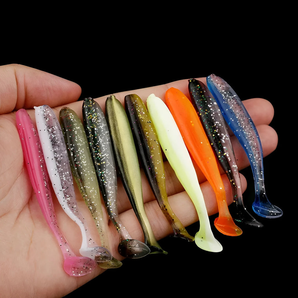 Soft plastic fishing lure with two-tone colouration and T tail, measuring 7cm
