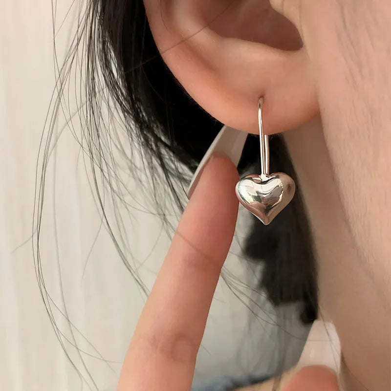 Korean style 3D glossy heart-shaped women's earrings with white gold colour finish