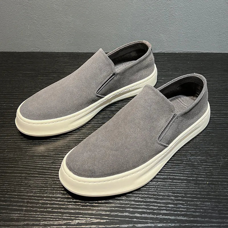 Men's grey casual lace-up shoes with round toe, stitching detail, and a rubber sole.