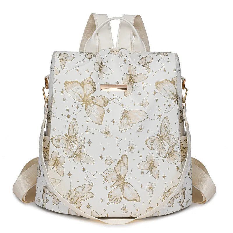 Butterfly print PU backpack in multiple colours with breathable back system and large capacity under 20 litres.