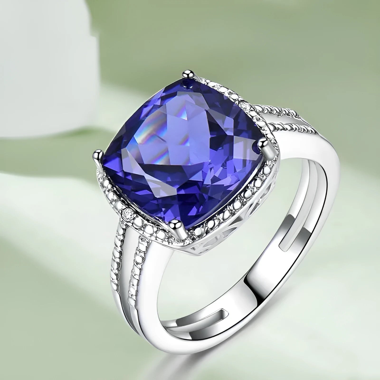 Women's sterling silver ring with blue Tanzanite gemstone, available in sizes 6 to 10