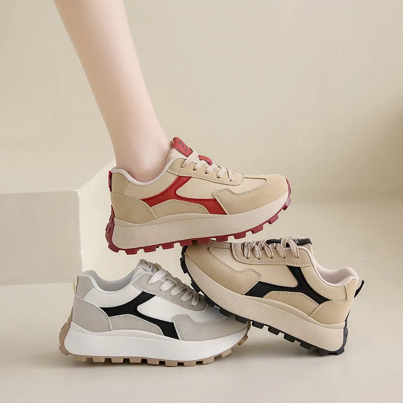 Women's solid colour low-top platform sports shoes with lace-up front and rubber sole.