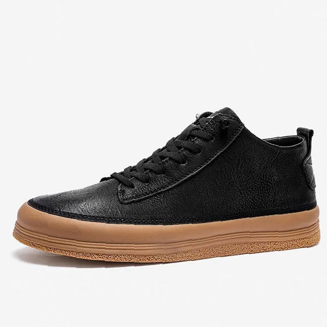 Men's black leather casual shoes with round toe and flat rubber sole on white background