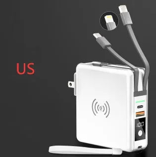 Black and white wireless charging power bank with foldable plug and set of four international travel adapter heads