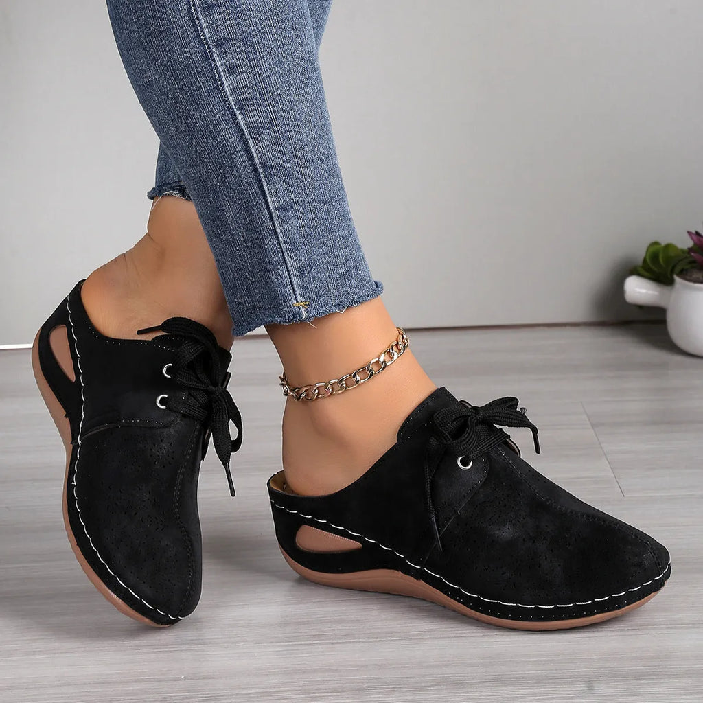Women's lace-up wedge slippers with hollowed-out design in suede and rubber construction