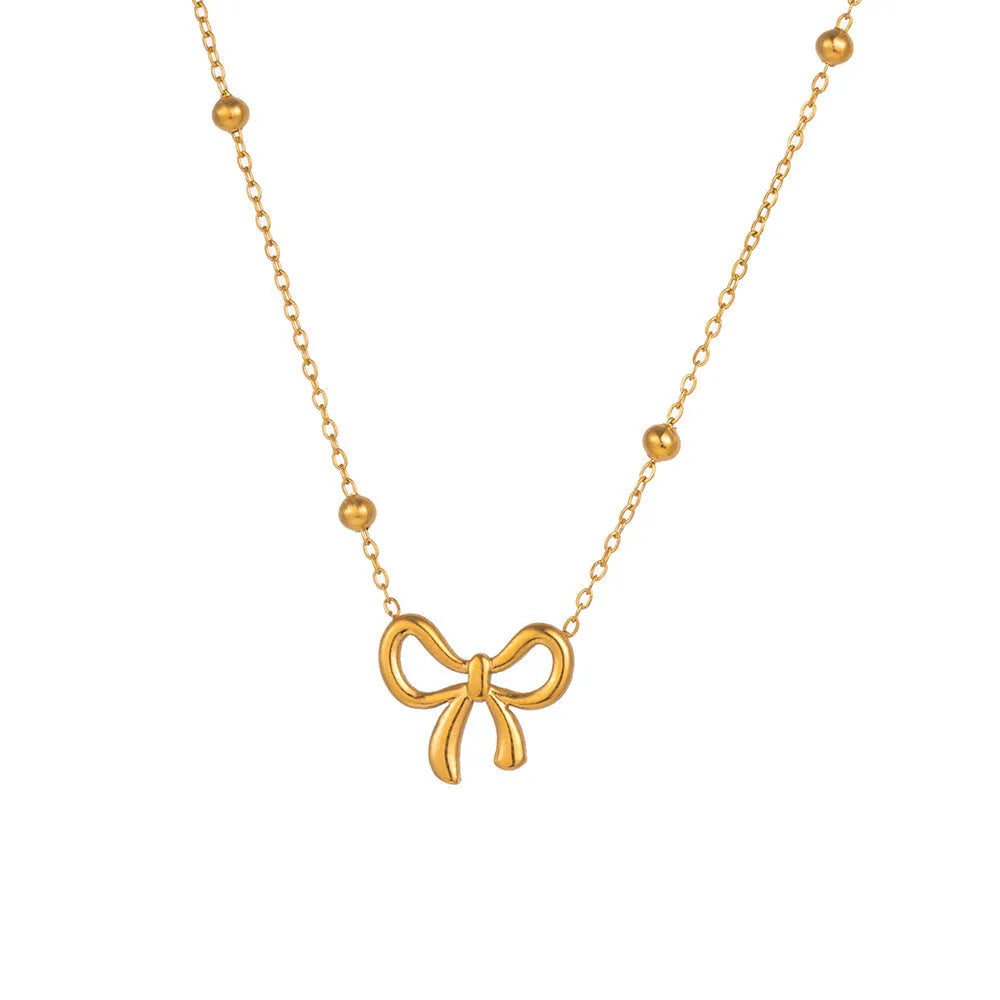 Gold electroplated bow necklace with titanium steel cross chain, adjustable 41-50cm length