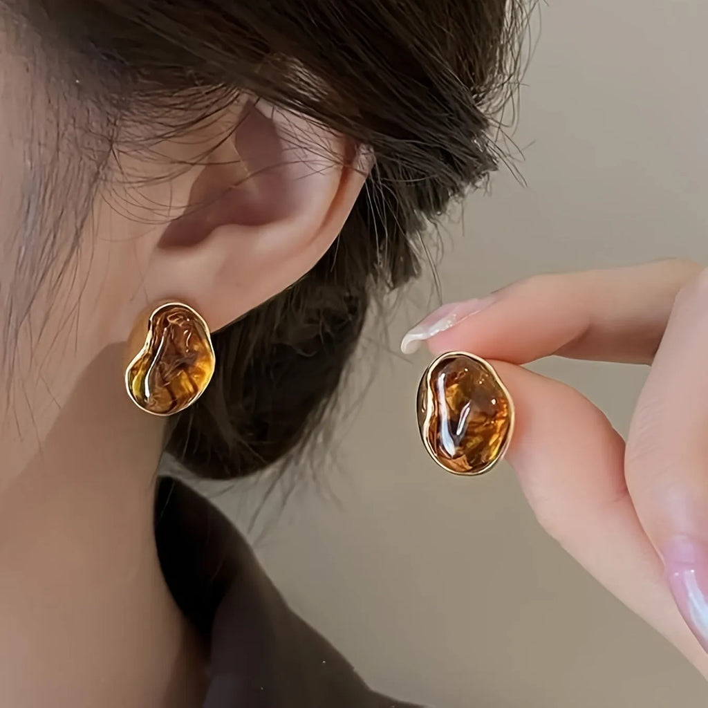 Handmade geometric earrings set with three styles including irregular, wafer and water drop shapes with tassel elements