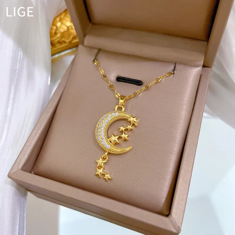 A218 moon pendant necklace with geometric diamond accents on stainless steel chain