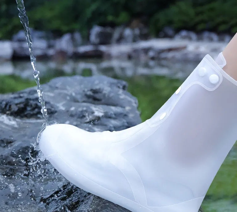 Women's white PVC high top water resistant shoe covers with anti-skid sole