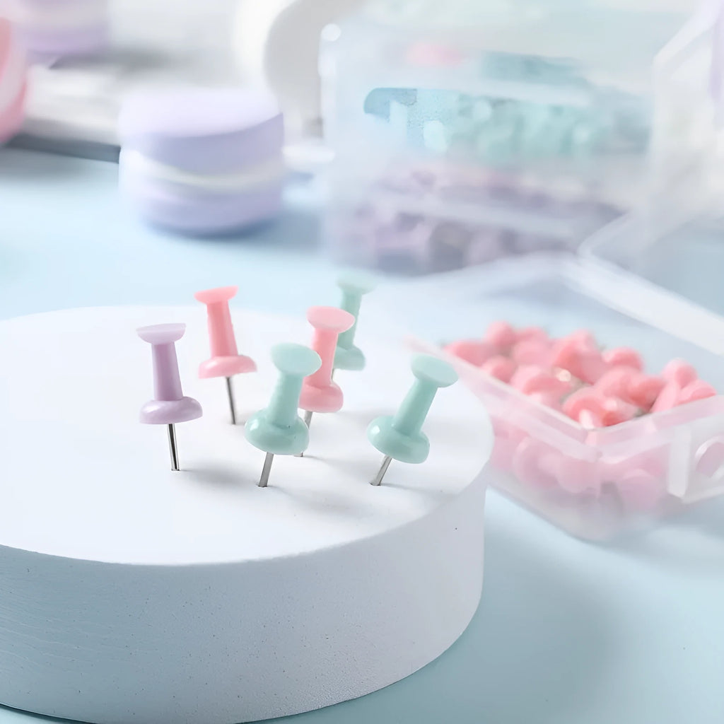 Plastic push pins in cherry blossom pink, mint green, and lavender colours showing large and small size options