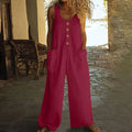Sleeveless cotton jumpsuit with wide leg trousers in retro style showing side pocket detail