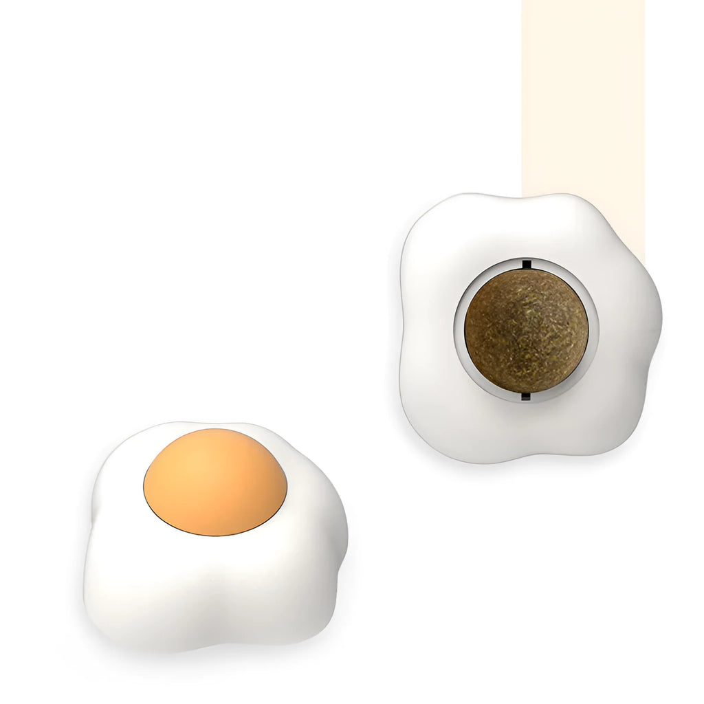 Interactive catnip ball toy in fried egg and poached egg shapes with natural filling