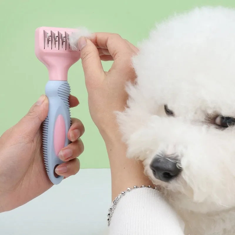 Stainless steel pet grooming comb with knot removal blade and massage tips in pink colour