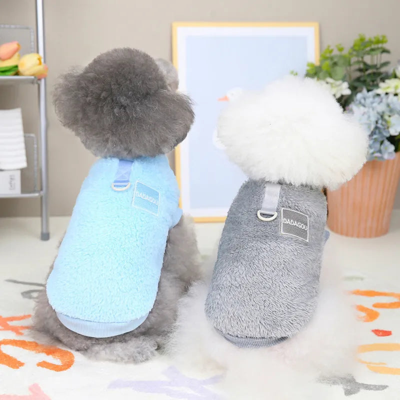 A blue coral fleece jacket for a dog, showing leg coverage and soft fabric texture.