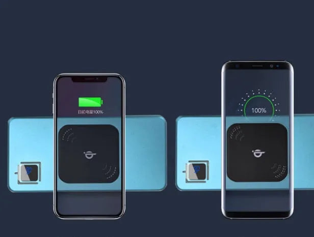 Silver portable power bank with LCD display showing battery percentage, next to a mobile phone.