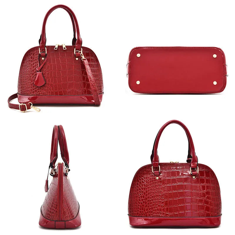 Shell-shaped shiny PU leather crossbody shoulder bag showing black, brown, and red colour options