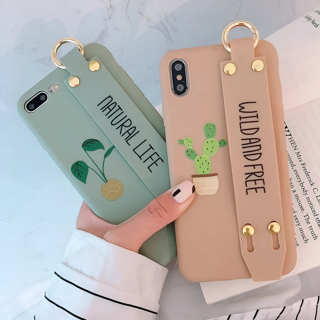 Green wristband holder phone case for iPhone showing integrated finger loop and protective back cover design