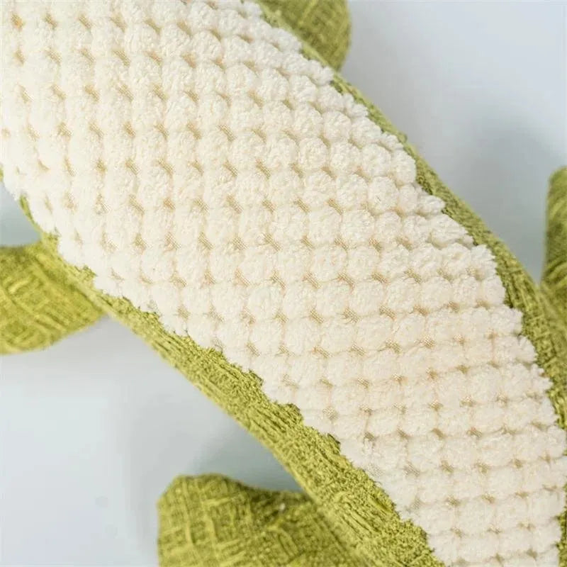 Blue, green, and red corn cob plush pet toys with textured grid pattern
