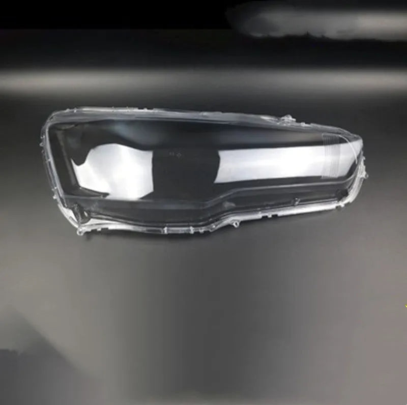 Transparent plastic headlight housing cover for vehicle lamp replacement measuring 50x30x20mm
