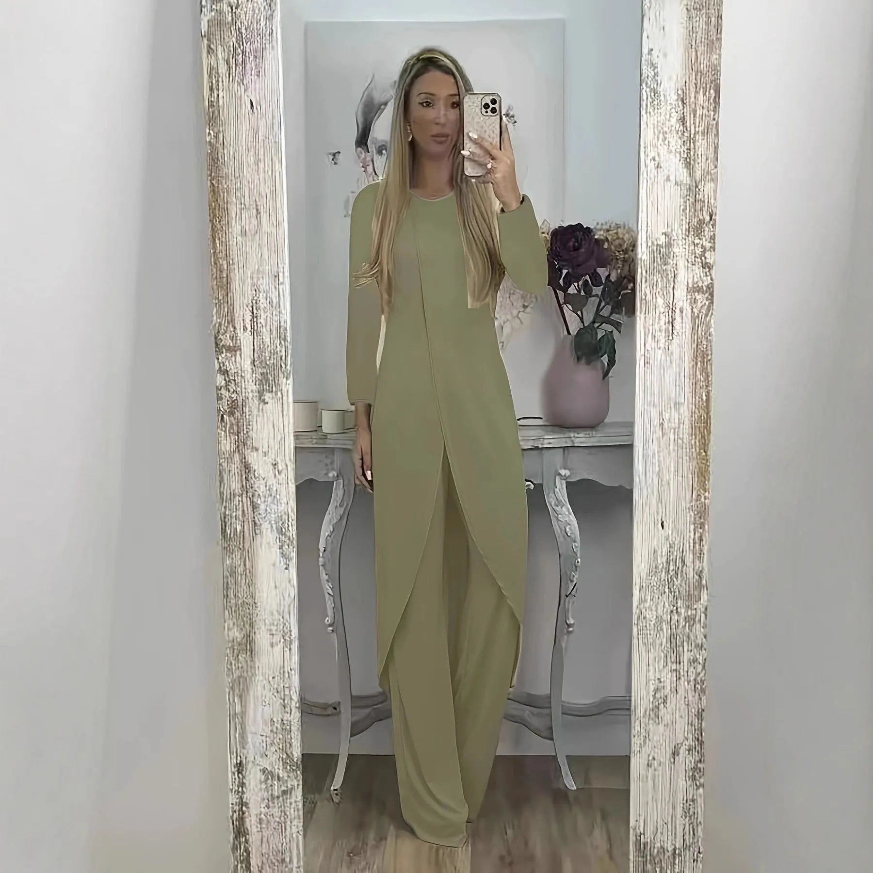 Women's black casual two-piece lounge set with long sleeves and matching trousers on a hanger